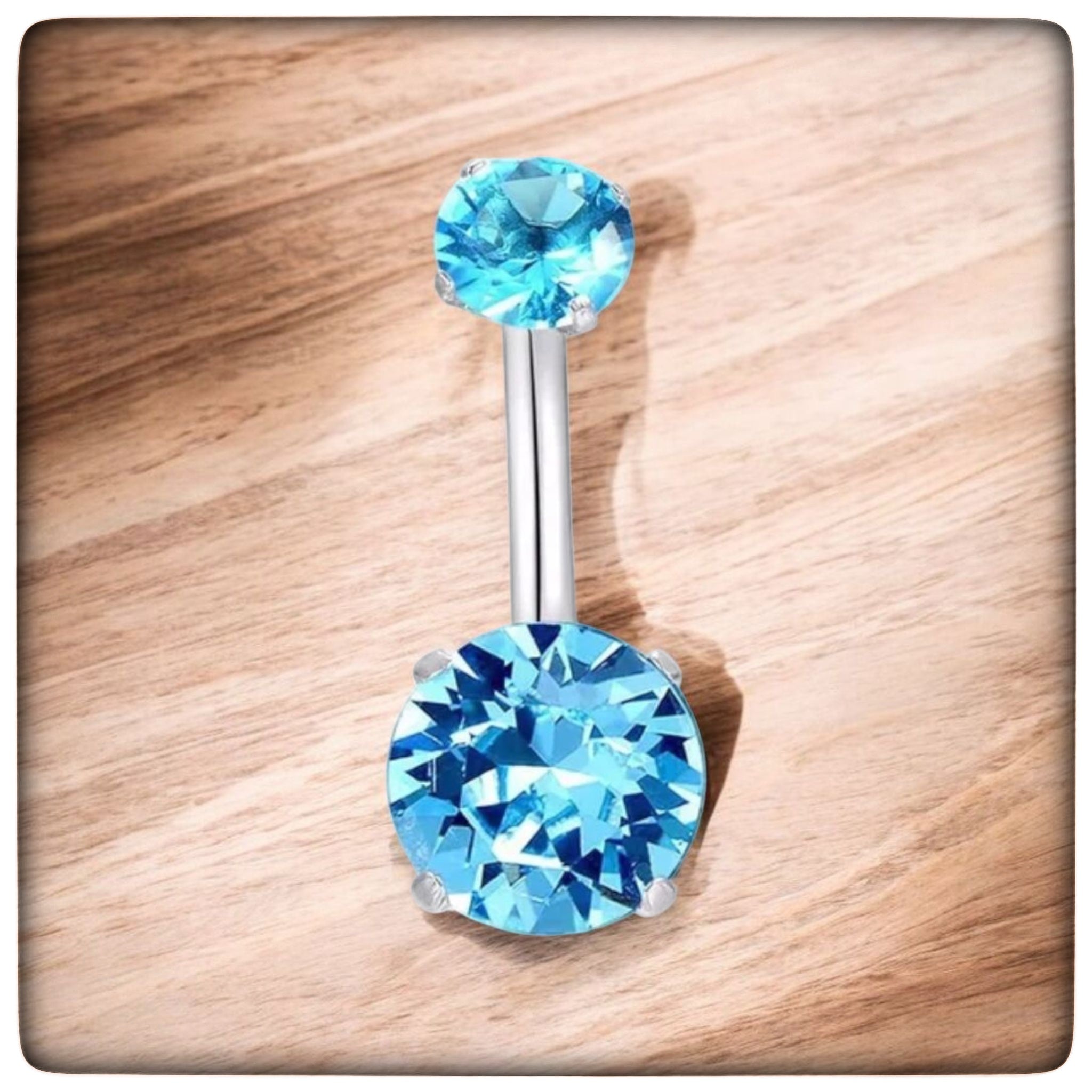 *Navel Curve Aqua Blue Prong Set Cubic Zirconia
