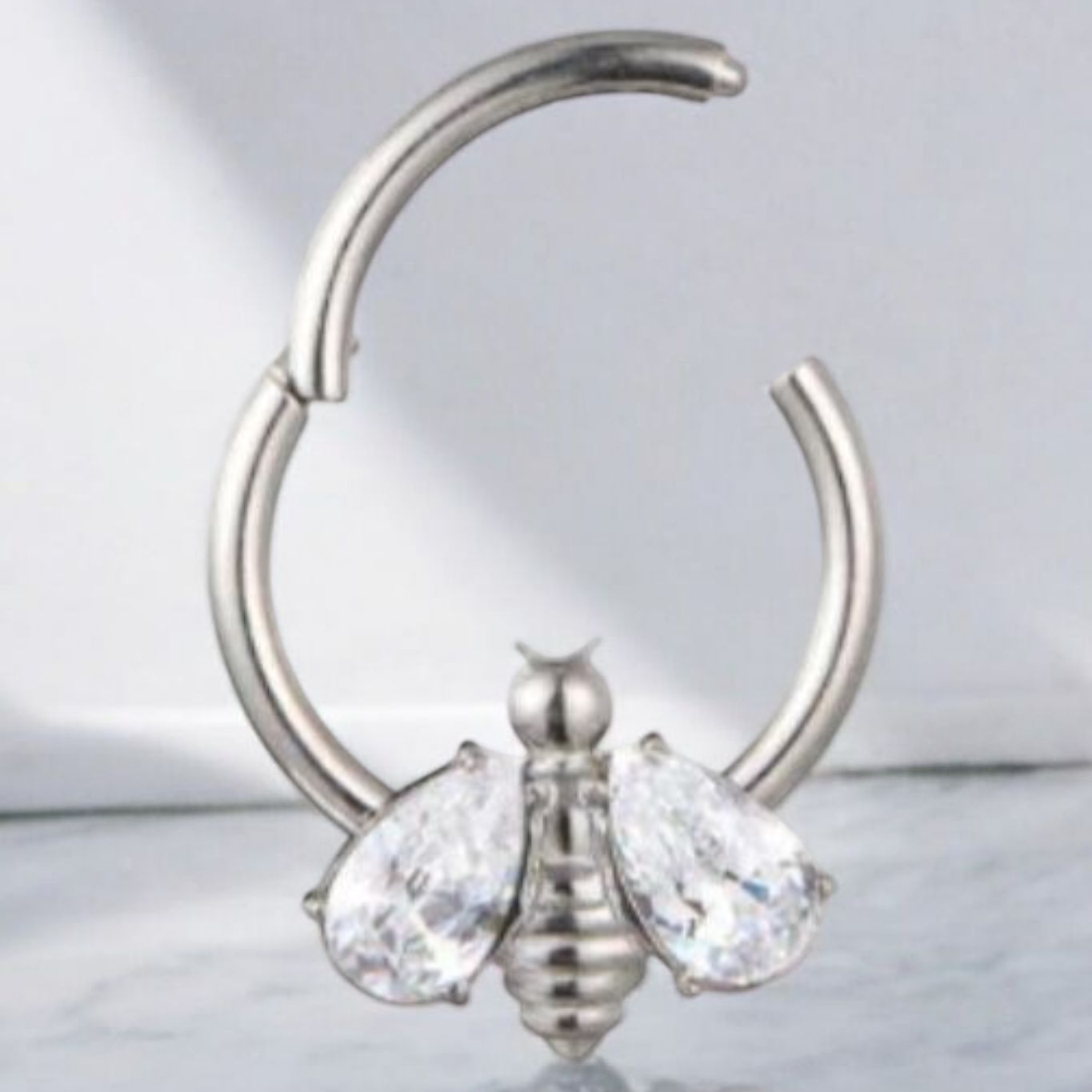 Bee Clear Cubic Zirconia Hinged Ring 10mm.