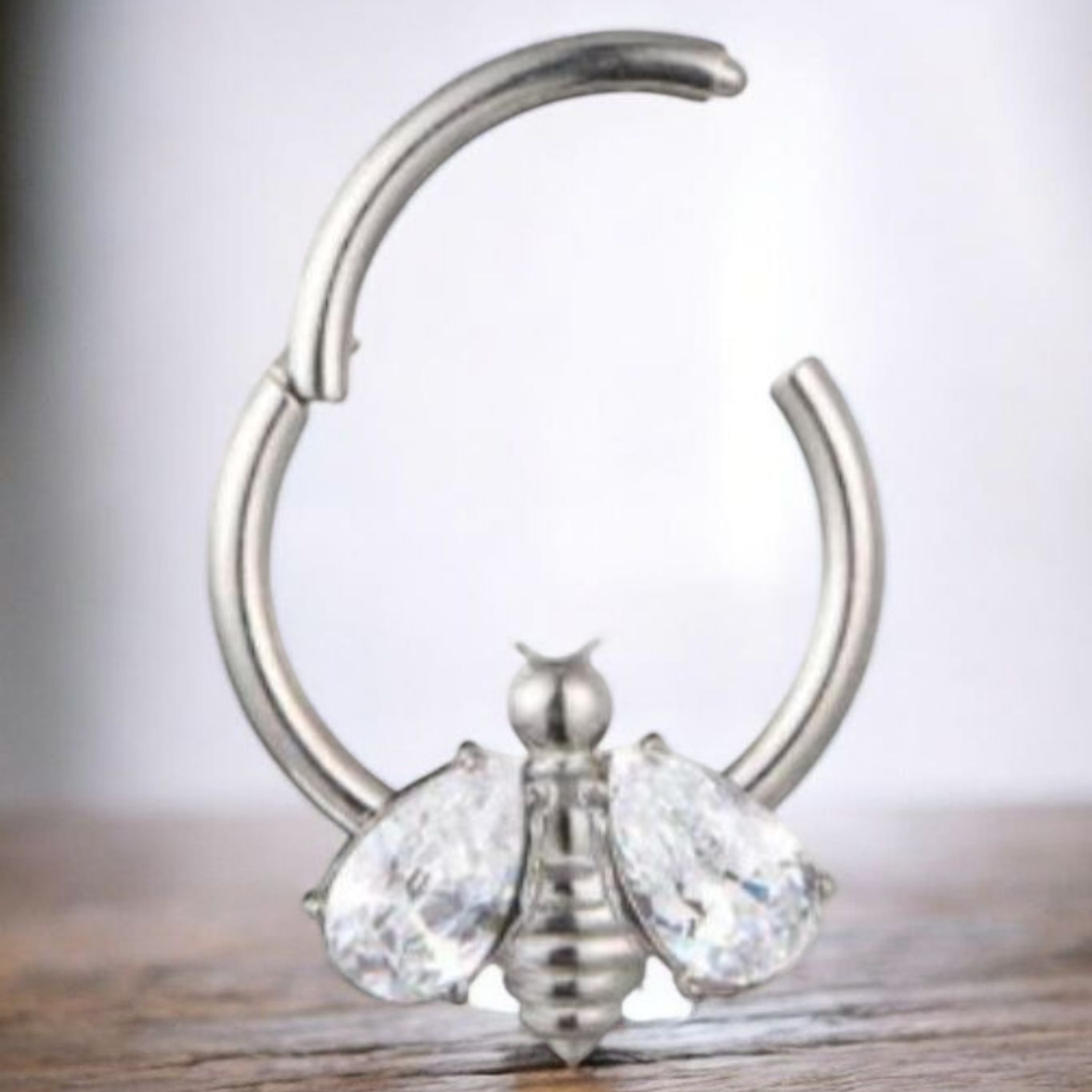 Bee Clear Cubic Zirconia Hinged Ring 10mm.