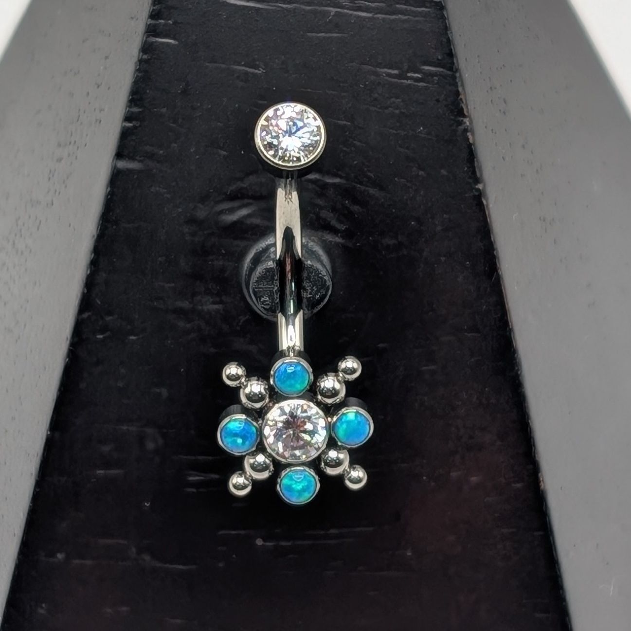 Navel Curve Blue Star Burst Bezel Set Crystal Clear Cubic Zirconia & Opal 12mm