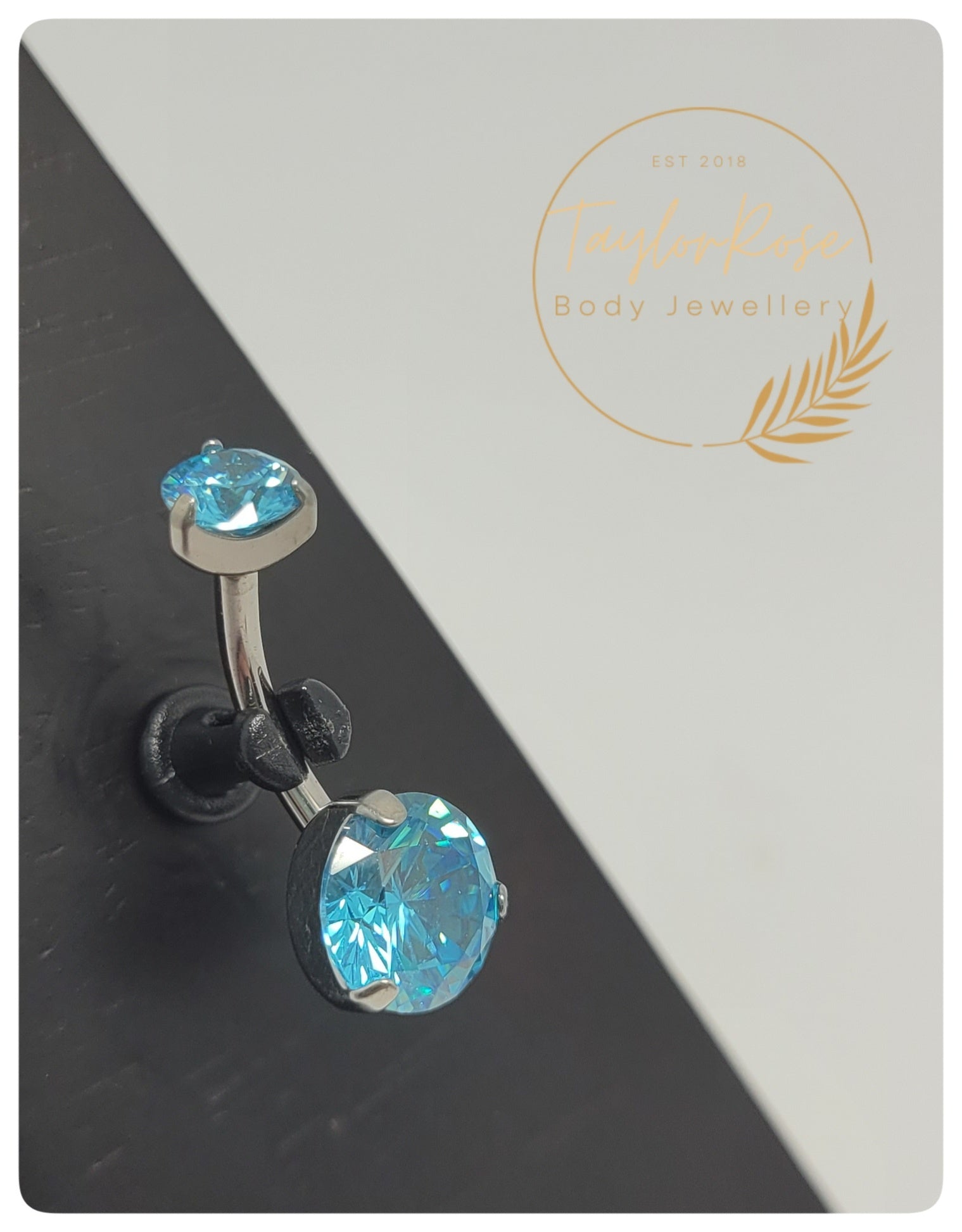 *Navel Curve Aqua Blue Prong Set Cubic Zirconia