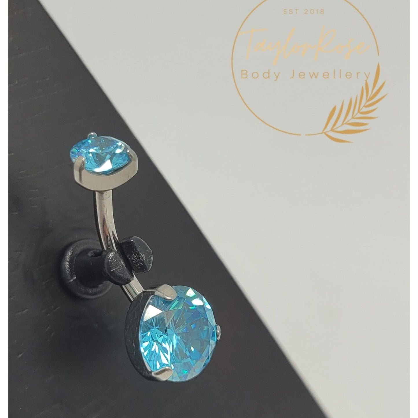 Navel Curve Aqua Blue Prong Set Cubic Zirconia