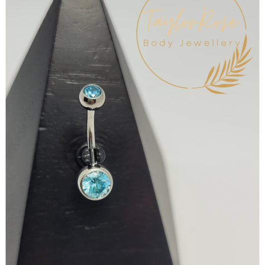 Navel Curve Aqua Blue Bezel Set Cubic Zirconia