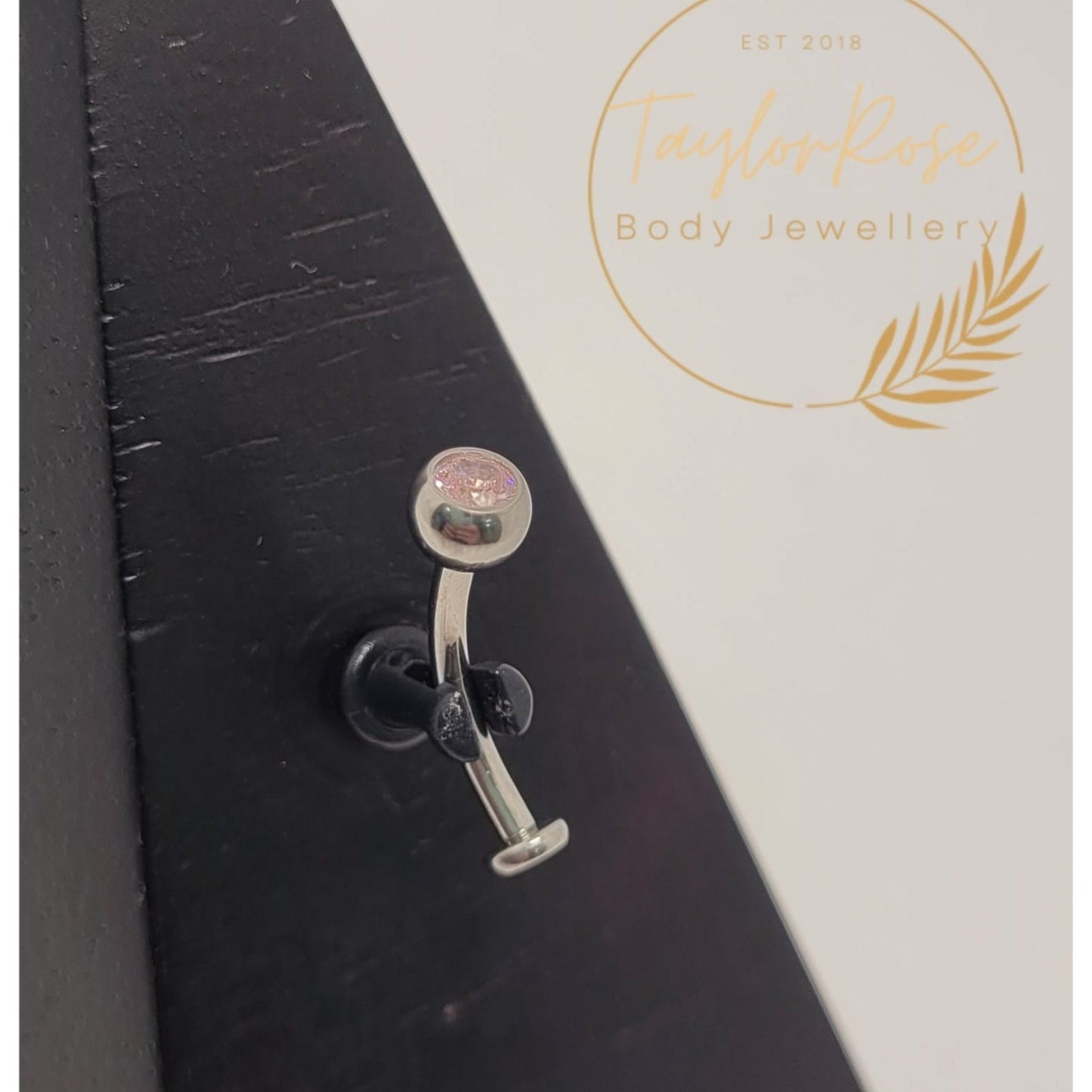 Floating Navel Curve Bezel Set Pink Cubic Zirconia
