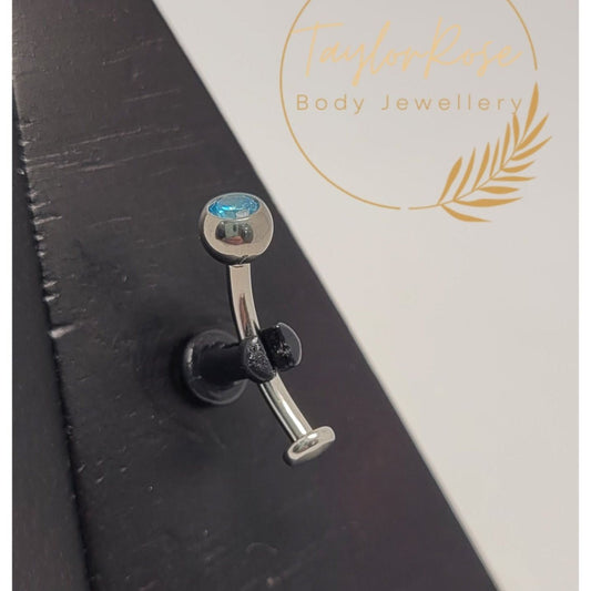 Floating Navel Curve Bezel Set Blue Cubic Zirconia