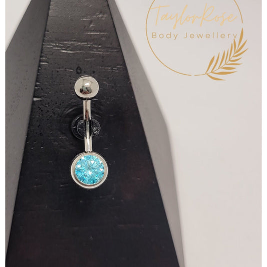 Navel Curve Aqua Blue Bezel Set Cubic Zirconia Bottom