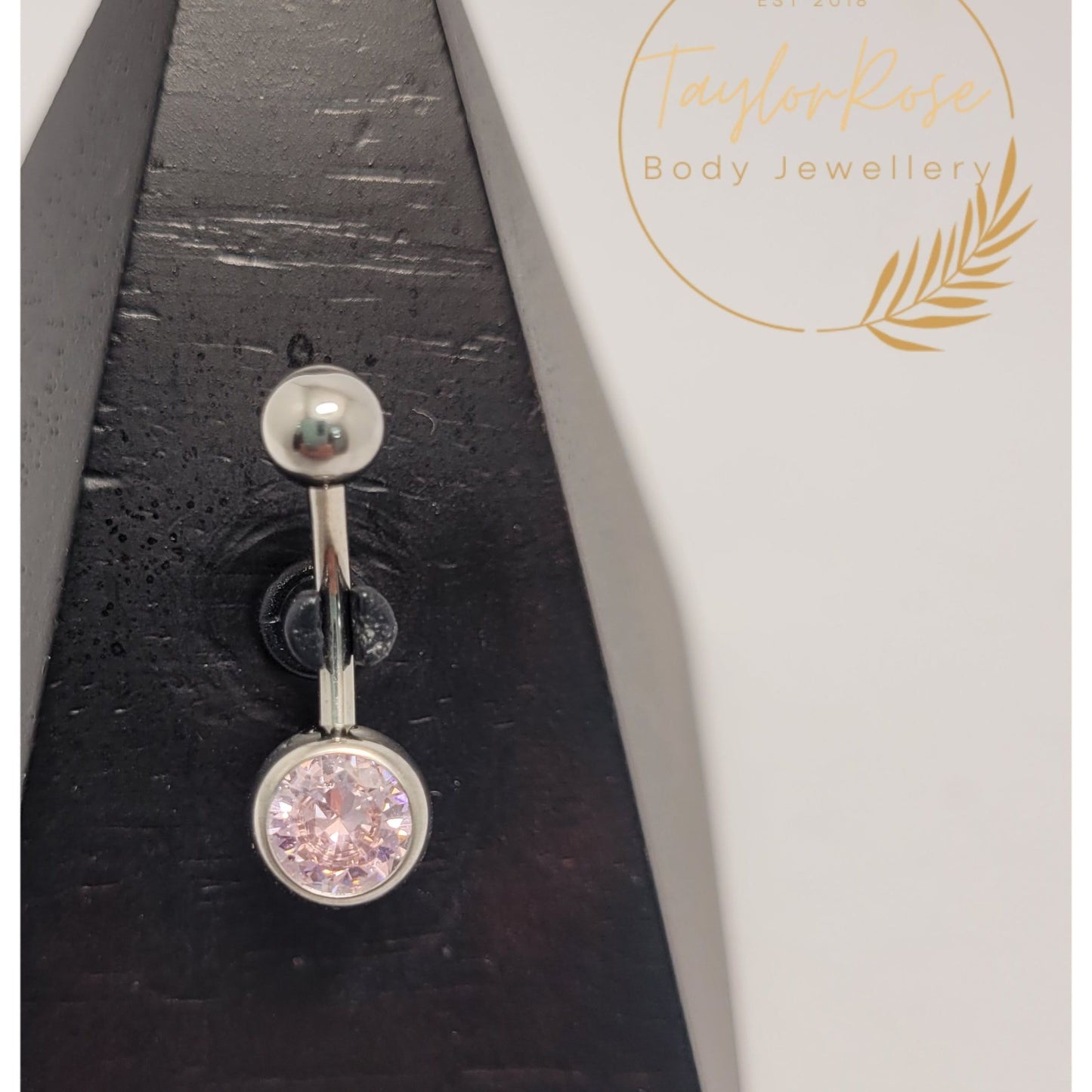 Navel Curve Pink Bezel Set Cubic Zirconia Bottom